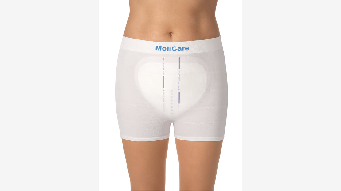 MoliCare Premium Fixpants weiße Fixierhose mit eingelegter Inkontinenzvorlage Vorderansicht